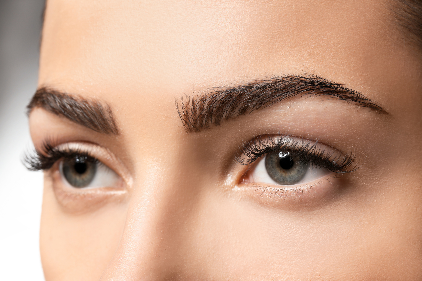 Young Woman with Beautiful Eyebrows